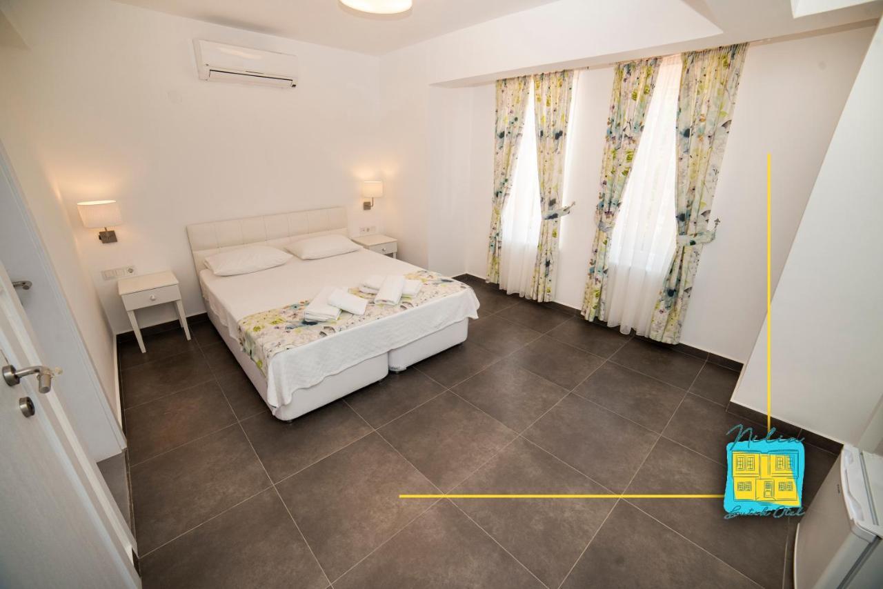 Nilia Butik Otel Бозджаада Экстерьер фото