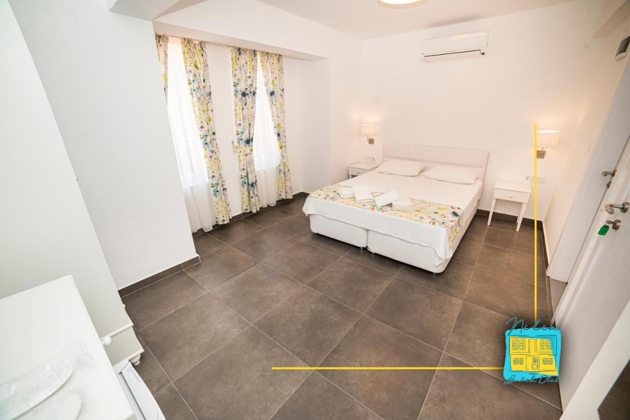 Nilia Butik Otel Бозджаада Экстерьер фото